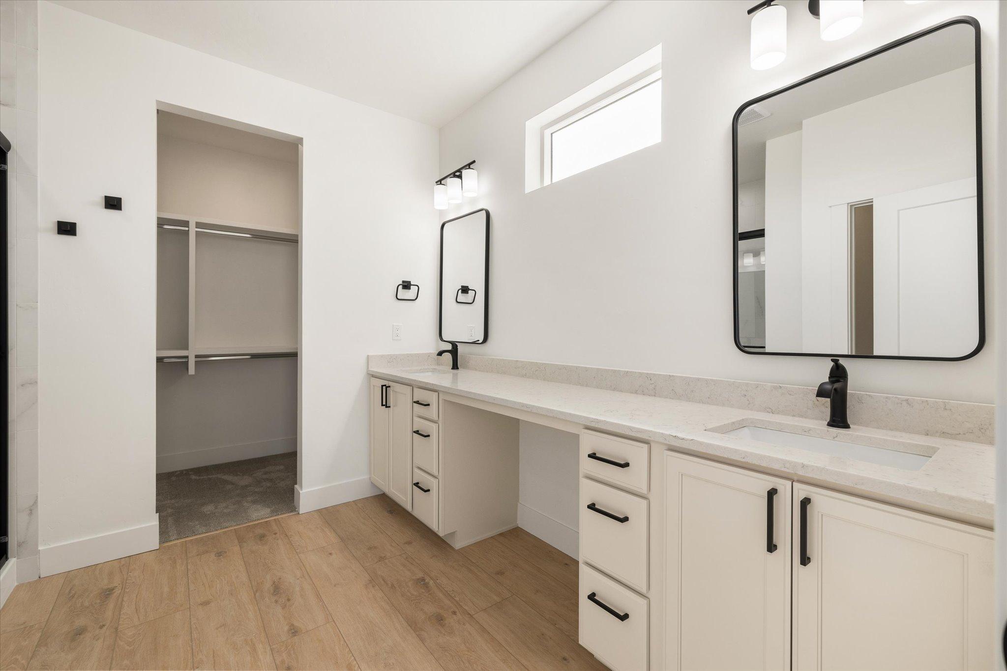Primary bathroom double vanity at 600 Fallen Leaf Avenue