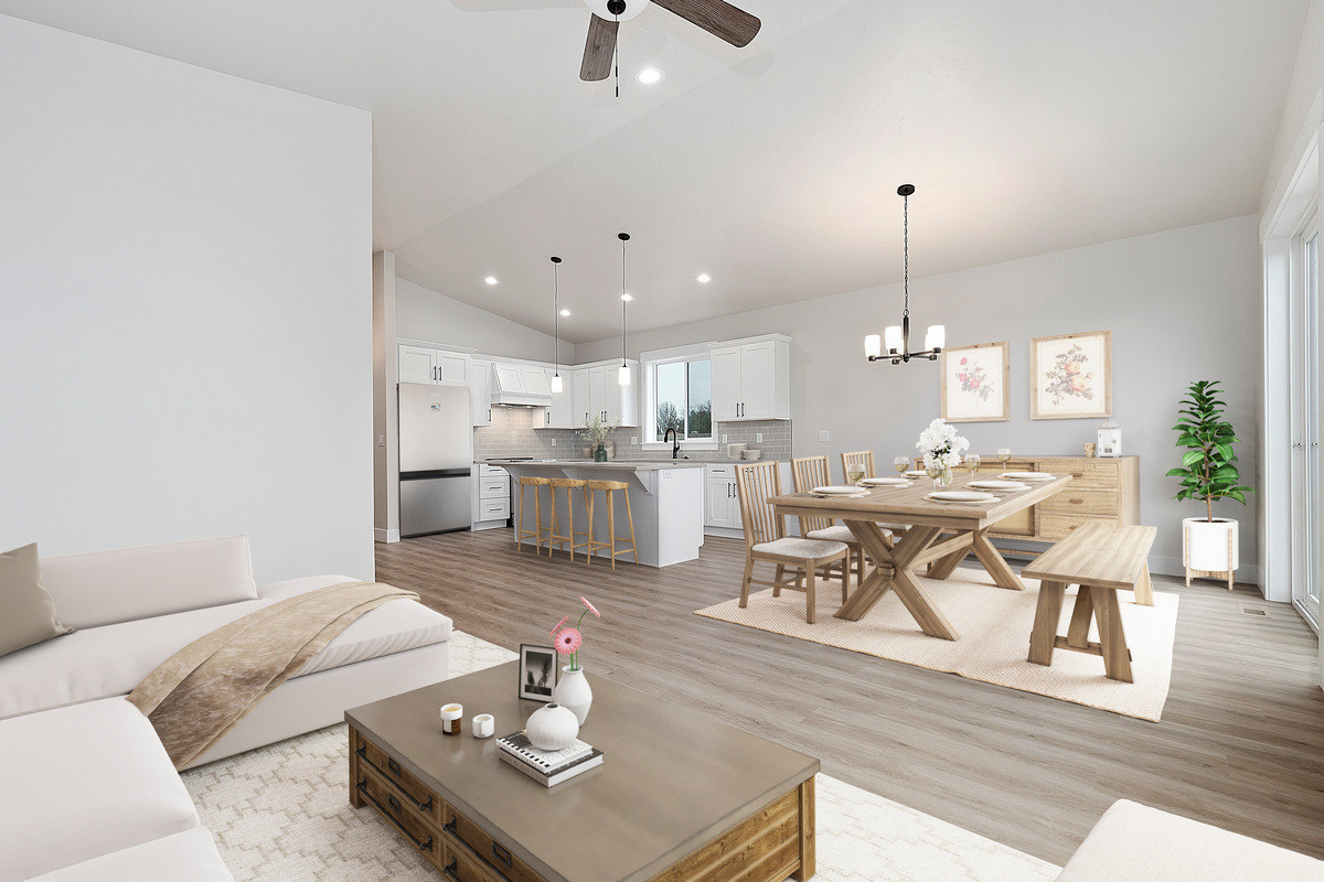 The open living, dining and kitchen area of the Payette floor plan by Bear Homes