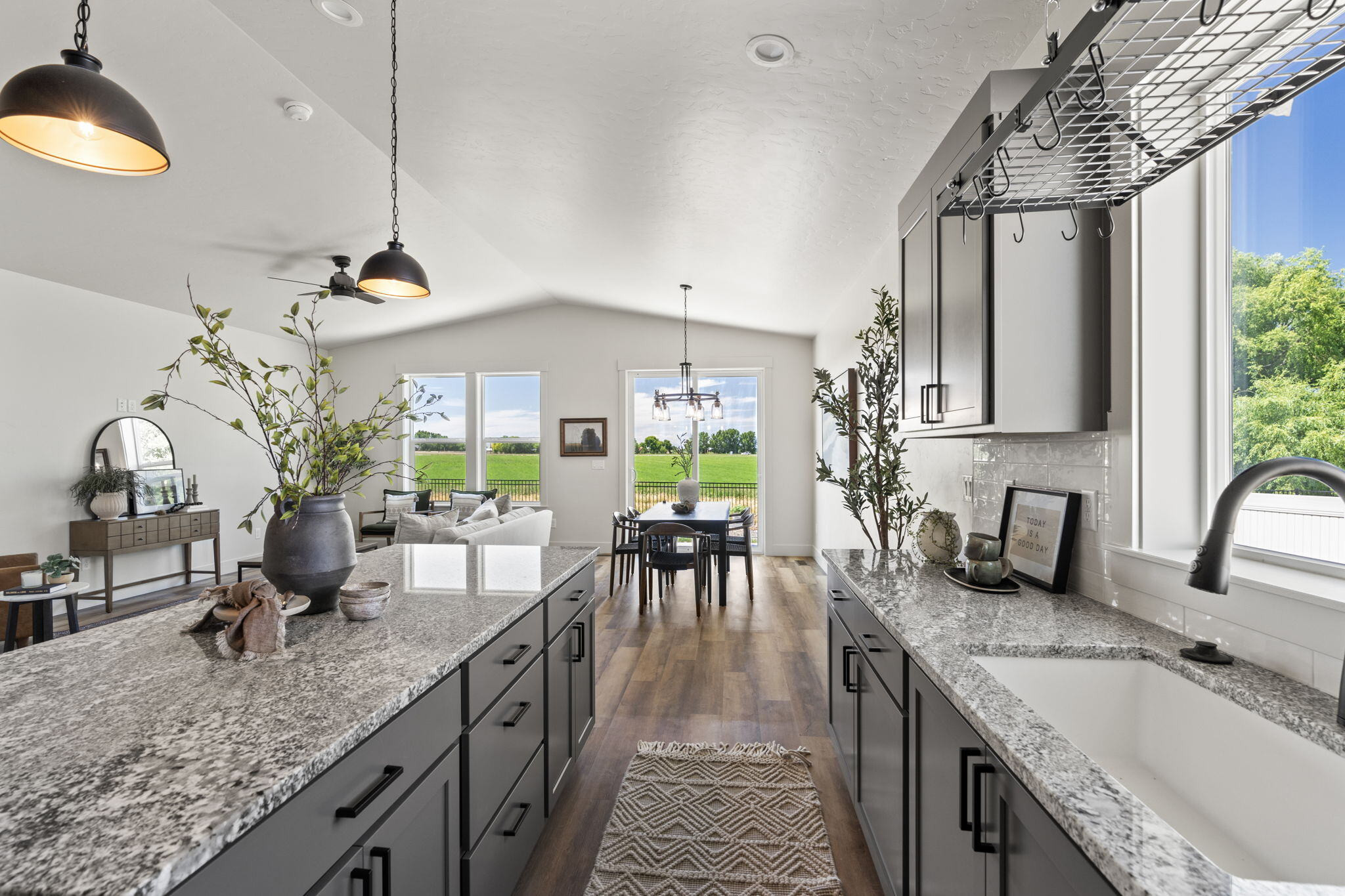 Open-concept kitchen and dining space in a Bear Homes build at Harvest Creek