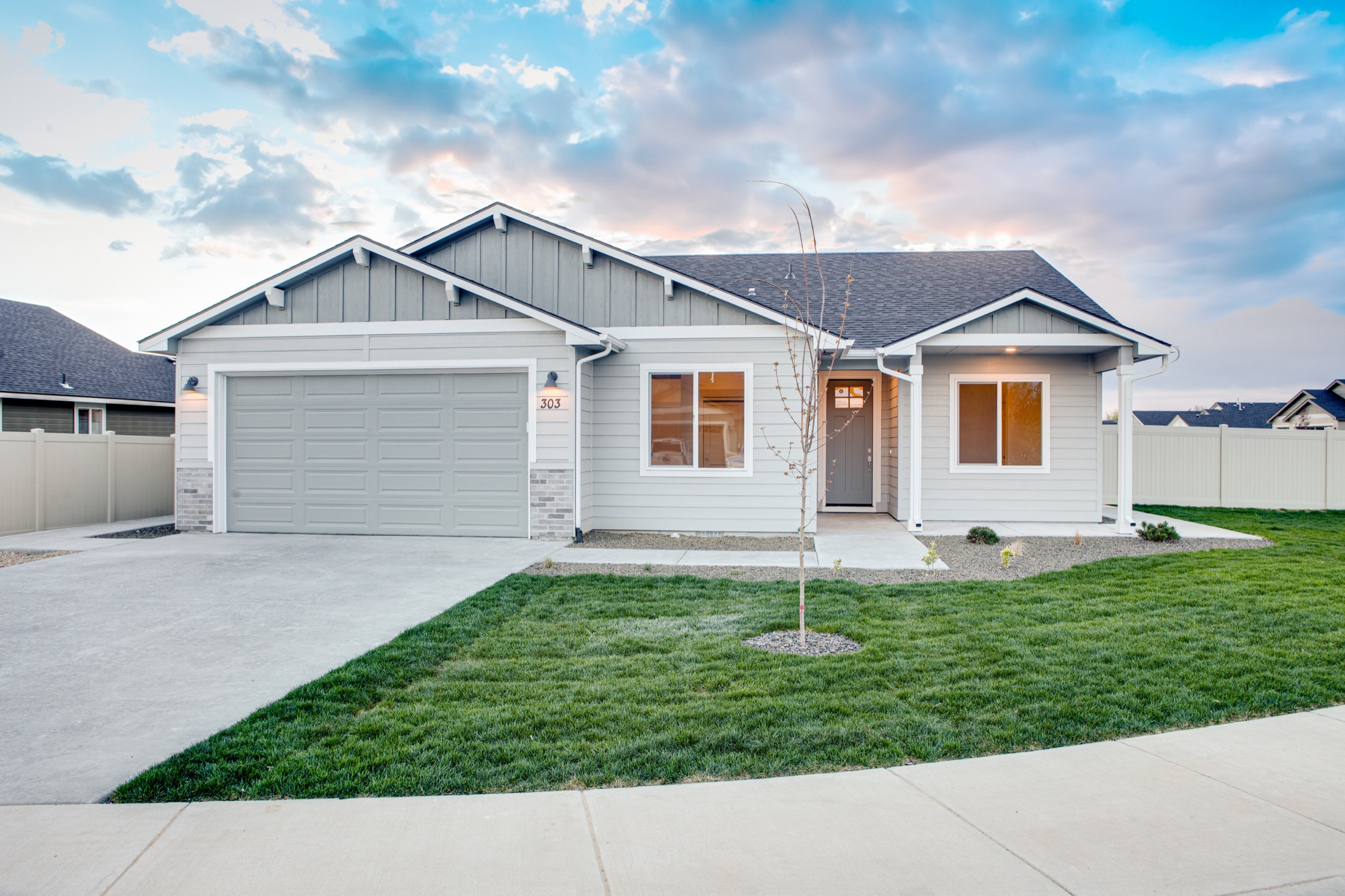 A Bear Homes craftsman home at dusk in the Treasure Valley, Idaho